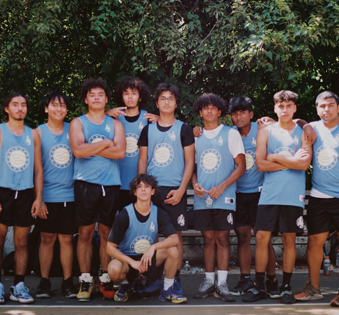 A team photo of a young basketball team